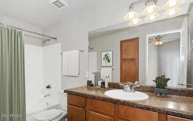 Building Photo - 9259 E Raintree Dr