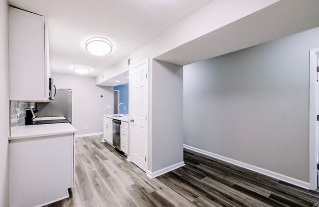 Building Photo - Spacious 2-Bedroom Elite Apartment with Private Balconies & Washer/Dryer