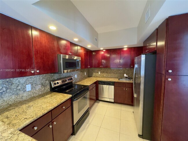 Building Photo - 5600 Collins Ave