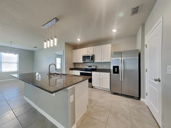 Building Photo - 5353 Arlington River Dr.