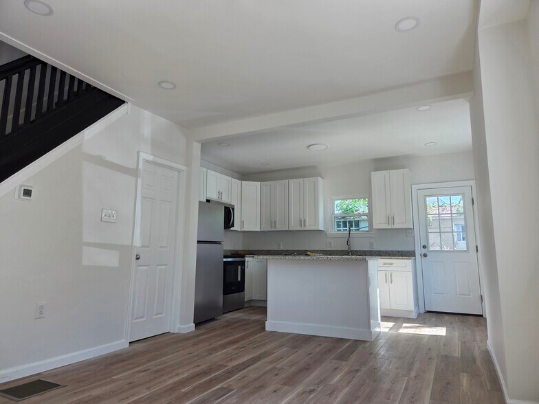 Open concept kitchen/dining area - 69 W 5th St