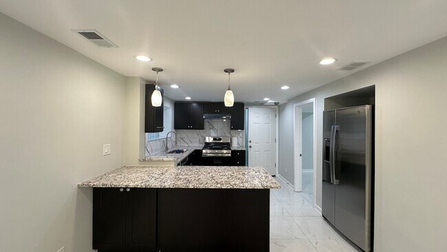 Building Photo - 5405 N Campbell Ave