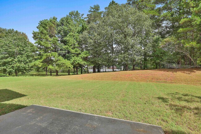 Building Photo - 4BR Home with Lake View in Swim Tennis Community