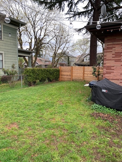 part of fenced backyard - 5703 N Commercial Ave