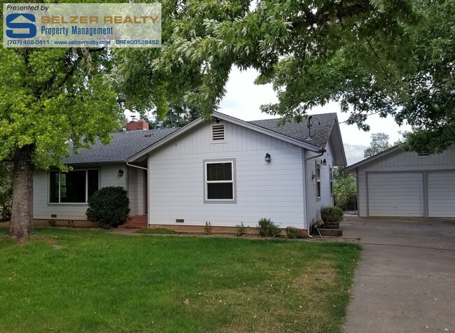 Primary Photo - Cozy 2 bd. country home set among the vine...