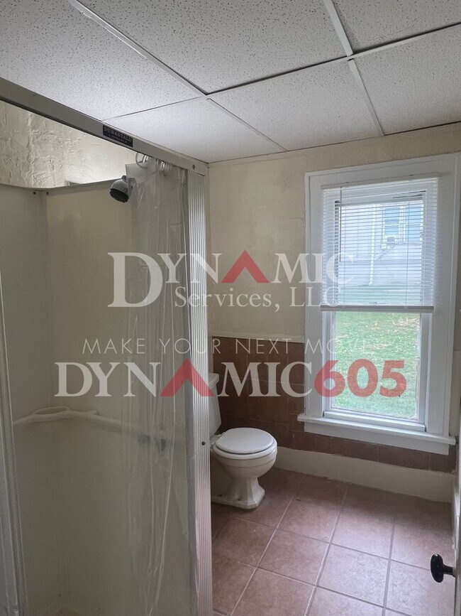 Building Photo - Studio with Bathroom - All Utilities Paid ...