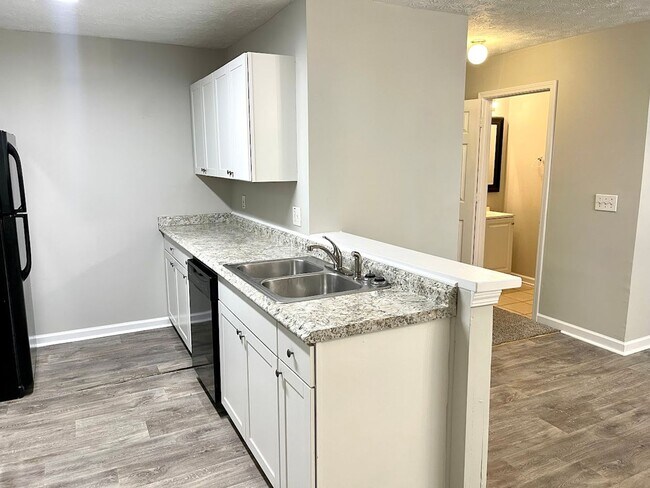 Building Photo - Welcome to this charming 3-bedroom, 2.5-bathroom townhouse located in the vibrant community of Li...