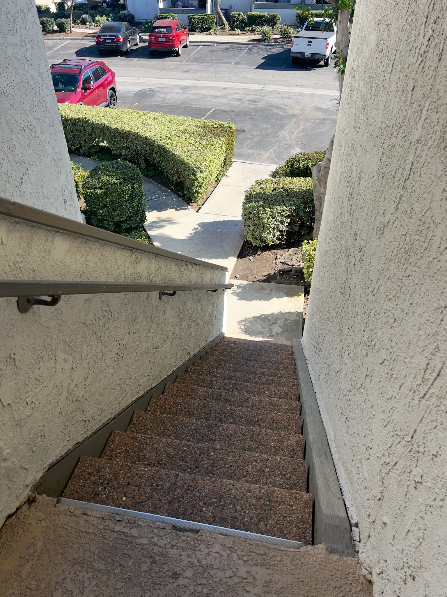 Stairs to parking lot with nearby parking to unit - 8 Town and Country Rd