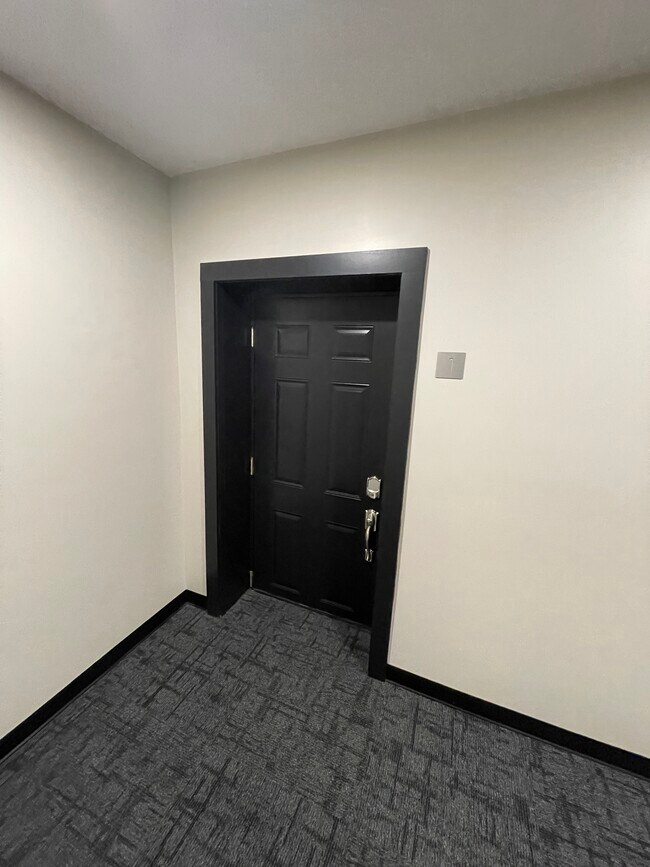 Main entry door to Apt 1 - 259 S Miami St
