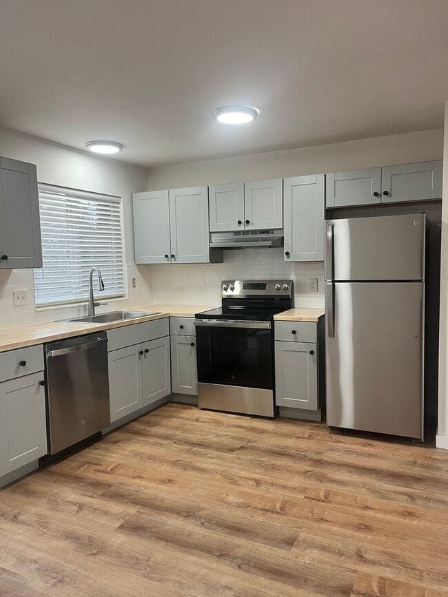 Building Photo - Fresh, Contemporary Remodel with Solar, Walk-In Closets & Great Outdoor Space