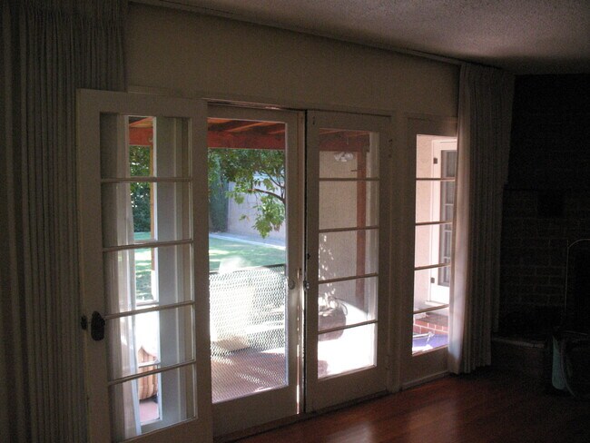 View to covered patio from living room French Doors - 3121 W Wyoming Ave