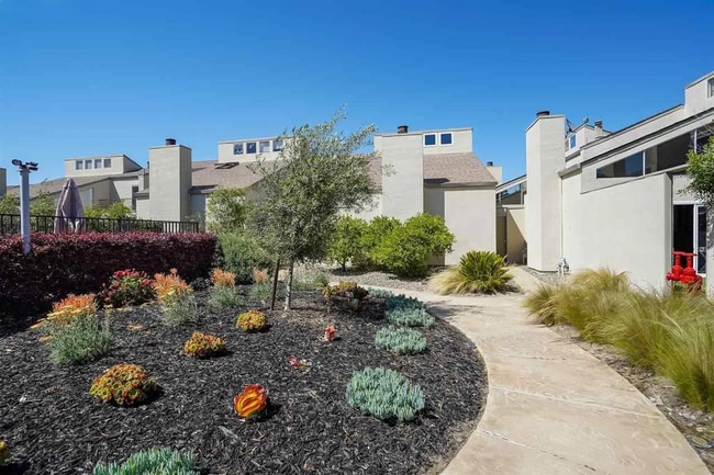 Building Photo - Spacious 1,550 Sq Ft Townhome | 2-Car Garage & High Ceilings w/ Exposed Beams