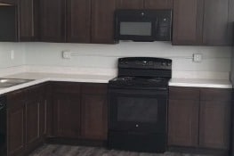 1 or 2 bed apt Kitchen - Harrison Court Apartments
