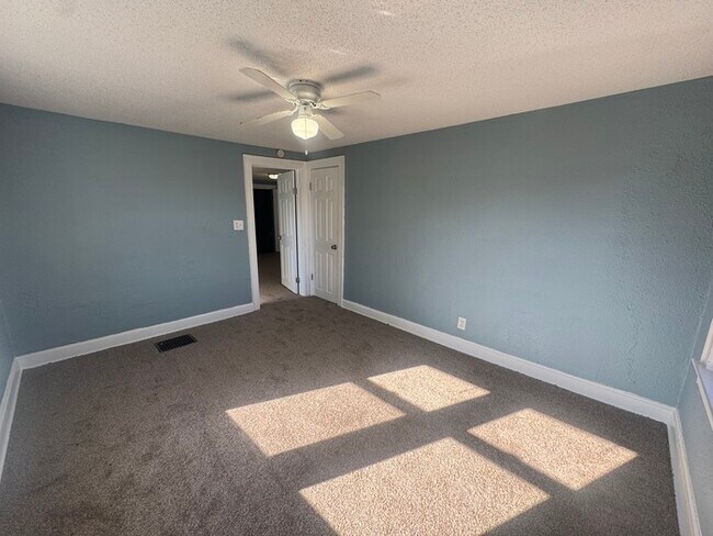 Building Photo - Charming 3BR 2BA Home w/ Fenced Yard + Covered Porch in KC