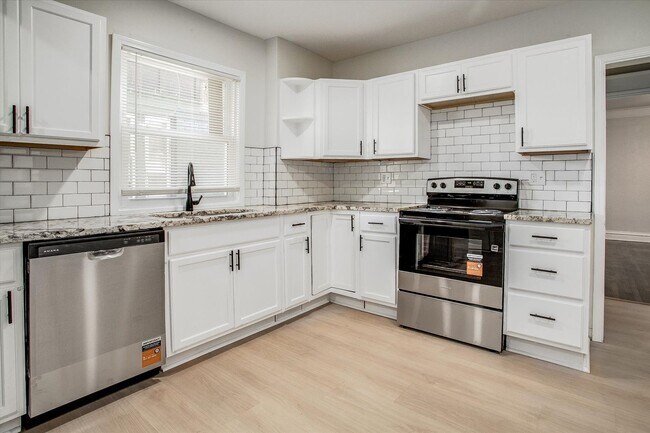 Building Photo - Move fast on this one. Apply within 24 hours of your showing and lock in $250 off your monthly re...