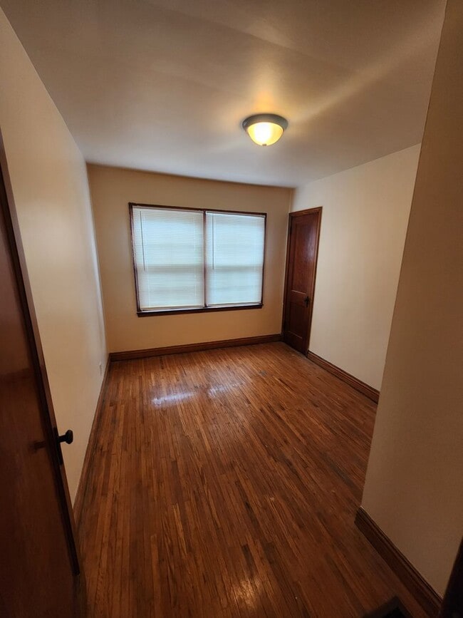 Building Photo - 2 bedroom, 1 bathroom, basement, garage, and extra space in finished attic not included in sq ft!!