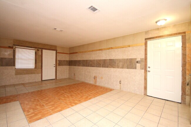 Building Photo - Updated 2BR/1BA Brick Duplex in North Pensacola with Tile Flooring Throughout, Included Utilities...