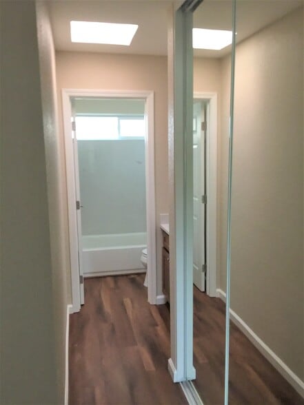 Hall storage and bath view - 1001 Murrieta Blvd