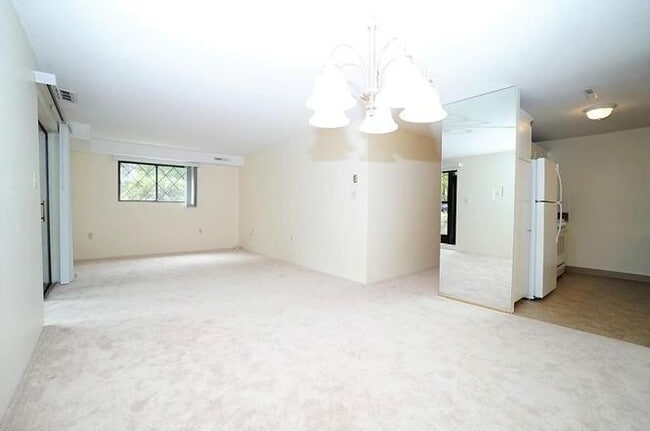 Building Photo - Spacious Condo with Parking, Heat/Hot Wate...
