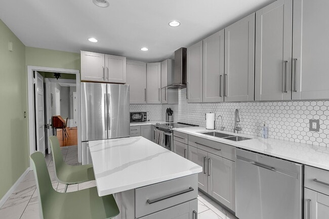 Building Photo - Furnished 4-Bedroom Home with a Private Pool near Elmwood Village