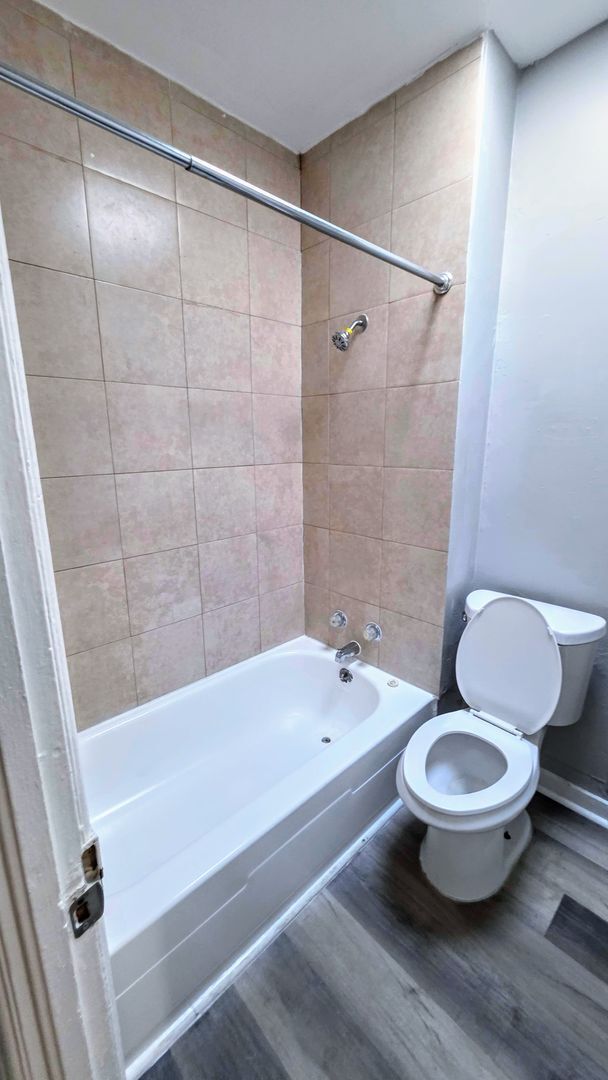 Building Photo - Beautiful Two Bedroom, Plus a Pass Through Room with a Fenced in Rear Patio