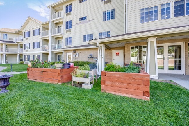 Community Raised Garden Beds - Whispering Chase Senior Apartments
