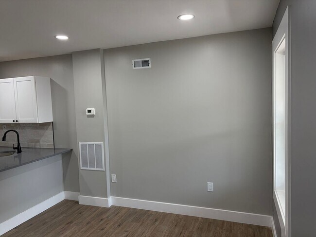 Building Photo - Newly Renovated 2- Story Townhome with Front Porch and Back Yard