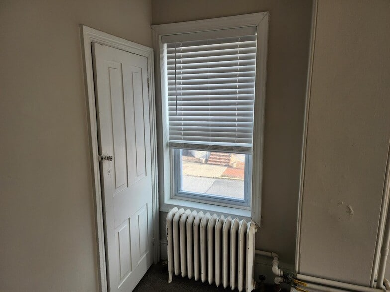 Bedroom 1 with closet shown - 601 Delaware St