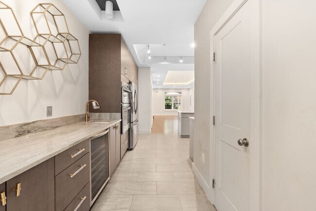 Building Photo - Experience stunning design and modern finishes in Columbia Heights!