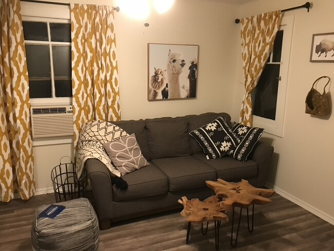 Living room area. Wifi is included. TV and Netflix included. - 700 Earlham St