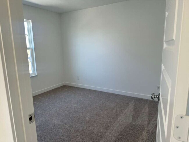 Building Photo - Beautiful new construction featuring 4 bedrooms and 2.5 baths, ideally located just minutes from ...