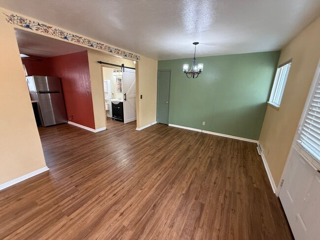 Building Photo - 4 Bedroom 2 Bathroom Home on Large Corner Lot with 2 Car Attached Garage In Great Neighborhood In...