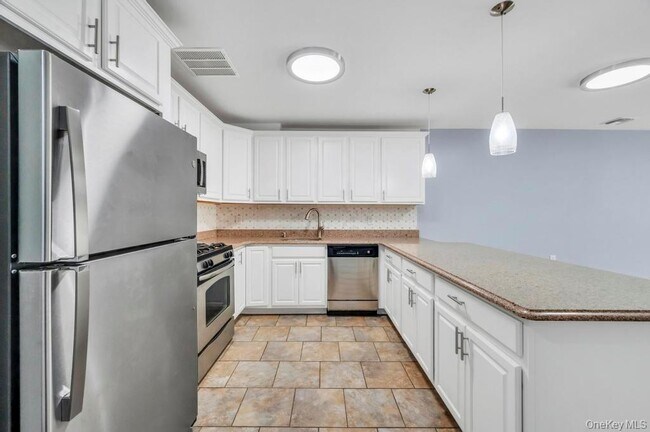 Building Photo - 102-20 Rockaway Beach Blvd