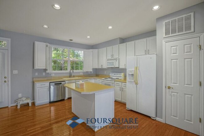 Building Photo - Lakefront Townhome with 1st Floor Bedroom, Fireplace & 2-Car Garage – In Raleigh