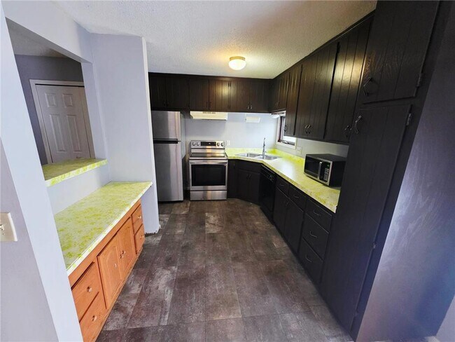 Building Photo - 8423 Brunswick Ave N