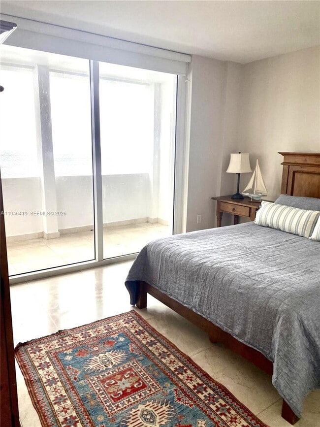 Building Photo - 10275 Collins Ave