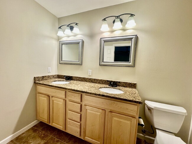 Building Photo - Four Bedroom Home with Private Fenced Back...