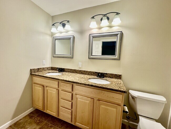 Building Photo - Four Bedroom Home with Private Fenced Back Yard in the Farm!