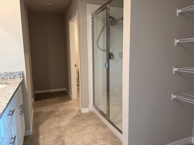 Building Photo - Like-New 4 Bedroom 3 Bath with Pond View & Two Living Spaces — Minutes to South Lake Nona