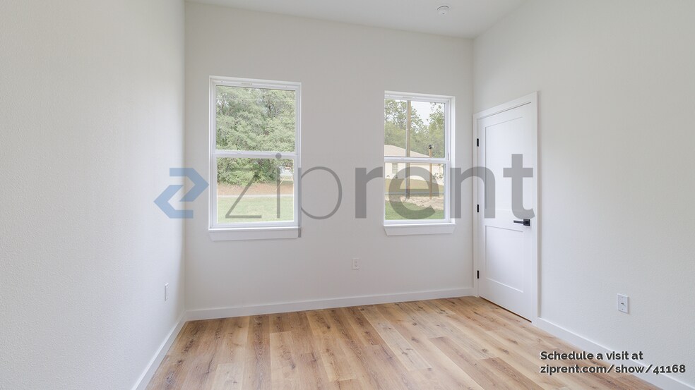 Building Photo - 8202 N Triana Dr