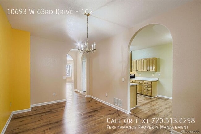 Building Photo - 10693 W 63rd Dr