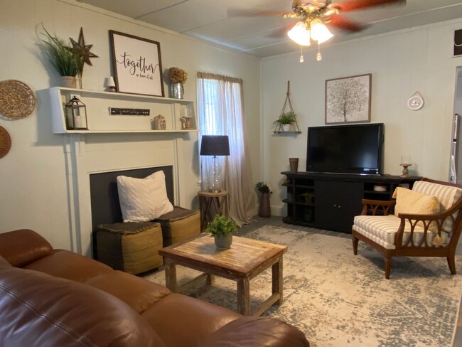 Building Photo - Partially Furnished Charming 4 Bedroom hom...