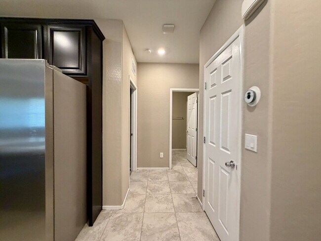 Building Photo - 3 BED 3 BATH 2 CAR GARAGE TOWNHOUSE W/ PRIVATE YARD, LOFT & BEDROOM DOWNSTAIRS IN GATED COMMUNITY...