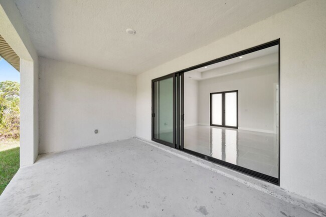 Building Photo - Single family for rent in Port Charlotte. New construction. 3+Den/ 2 bath. City water.