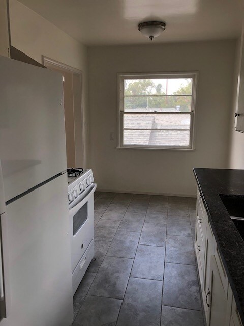 Includes refrigerator & stove - 610 S Main St