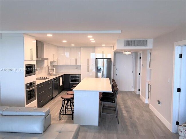 Building Photo - 5701 Collins Ave