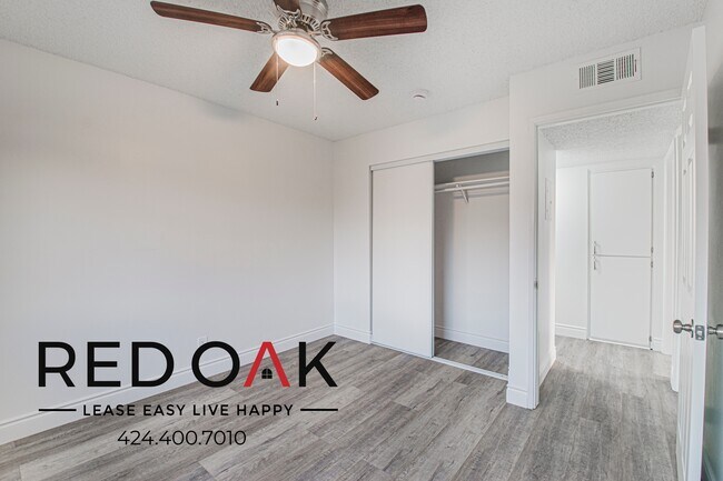 Building Photo - 10133 Pinewood Ave