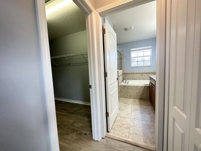 Building Photo - "Spacious 5-Bedroom Retreat with Scenic Views in The Verandahs!"