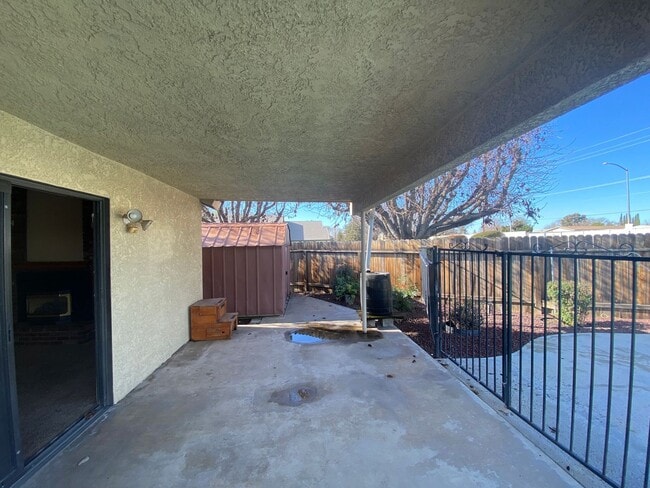 Building Photo - Get ready for Summer in this 3 BD 2 BA SW home with a Pool on a corner lot