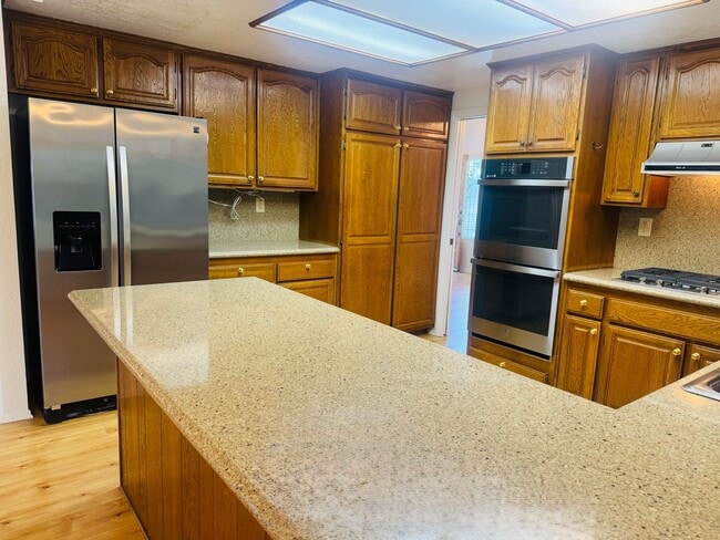 Building Photo - Beautifully Remodeled Lang Ranch Home – Steps from Top-Rated School